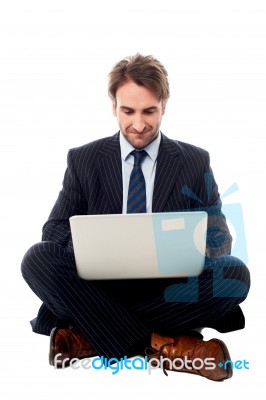 Corporate Male Executive With Laptop Stock Photo