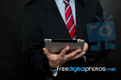 Corporate Male Using Tablet Pc Stock Photo