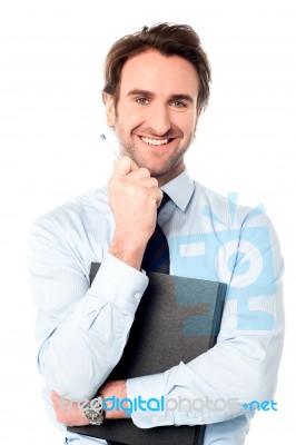 Corporate Man Holding Important File Stock Photo