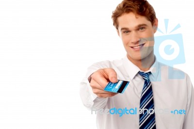 Corporate Man Offering You Credit Card Stock Photo