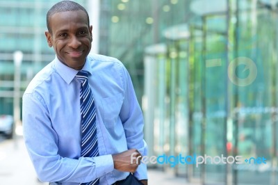 Corporate Man Poses Casually At Outdoor Stock Photo