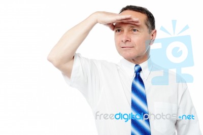 Corporate Man Searching For Something Stock Photo