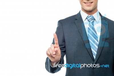 Corporate Man Showing Index Finger Stock Photo