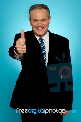 Corporate Man Showing Thumbs Up Stock Photo