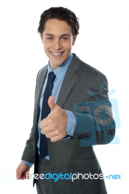 Corporate Man With Thumbs Up Sign Stock Photo