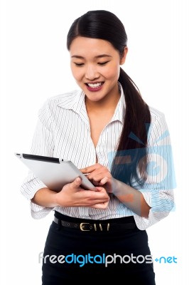 Corporate Woman Brwosing On Tablet Pc Stock Photo