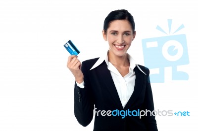 Corporate Woman Displaying Credit Card Stock Photo