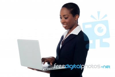 Corporate Woman Working On Laptop Stock Photo