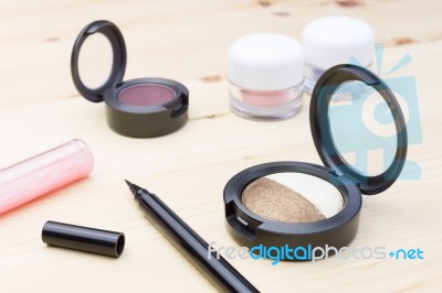 Cosmetics Eyeshadow On Wood Table Stock Photo