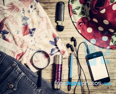 Costumes Of The Travelers On Wooden Floor Stock Photo