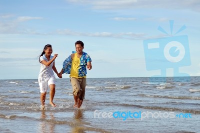 Couple At Beach Stock Photo