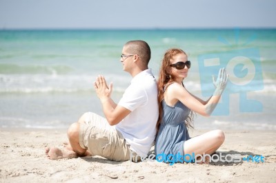 Couple Doing Yoga Stock Photo