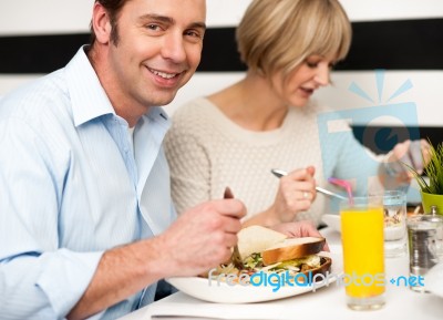 Couple Enjoying Dinner Stock Photo