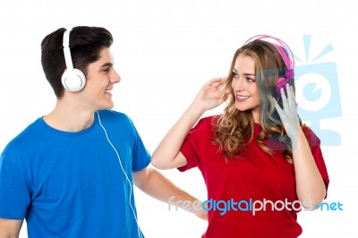 Couple Enjoying Romantic Music Together Stock Photo