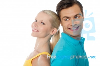 Couple Facing Back To Back Stock Photo