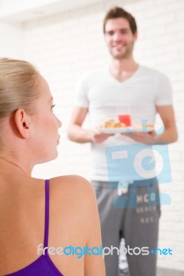 Couple Having Breakfast At Home Stock Photo