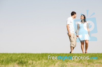 Couple Holding Hands Stock Photo