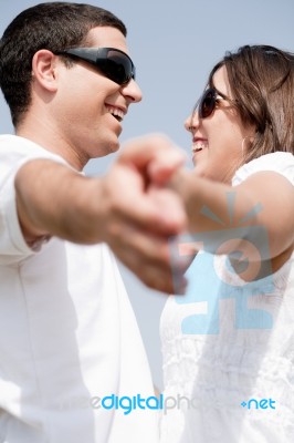 Couple Holding Hands Stock Photo