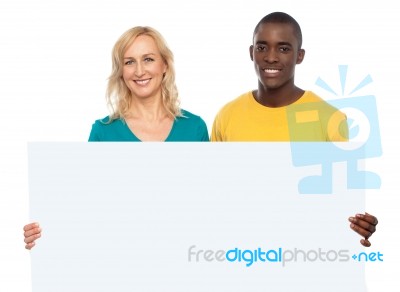 Couple Holding White Blank Board Stock Photo