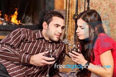 Couple In Love Near Fireplace Stock Photo