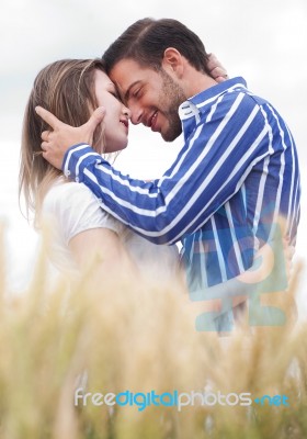 Couple In Love Under The Sky Stock Photo