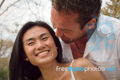 Couple In The Park Stock Photo