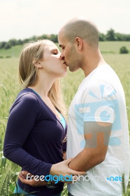 Couple Kissing Eachother Stock Photo