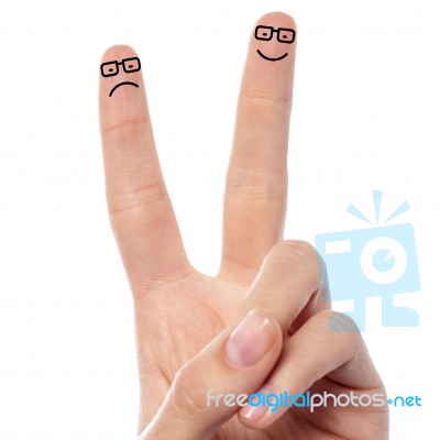 Couple Of Fingers With Sketched Smiley Stock Photo