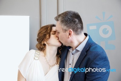 Couple Of Newlyweds Kiss Stock Photo