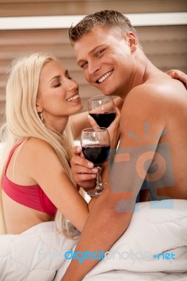 Couple Sharing Wine Stock Photo