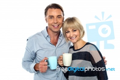 Couple Starting Their Day With A Cup Of Coffee Stock Photo