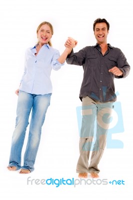 Couple Walking Hand In Hand Stock Photo