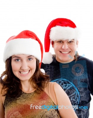 Couple Wearing Christmas Hat Stock Photo