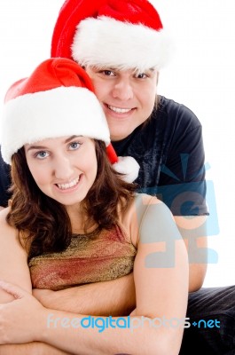 Couple Wearing Christmas Hat Stock Photo