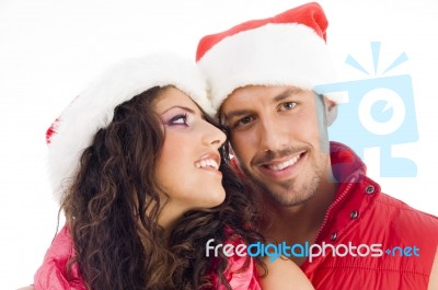 Couple Wearing Christmas Hat Stock Photo