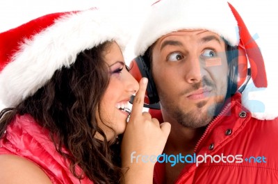 Couple Wearing Christmas Hat Stock Photo