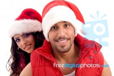 Couple Wearing Christmas Hat Stock Photo