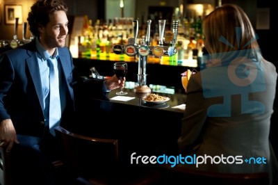 Couples At Bar Stock Photo