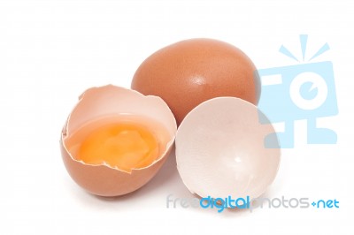 Cracked Egg With Yolk Stock Photo