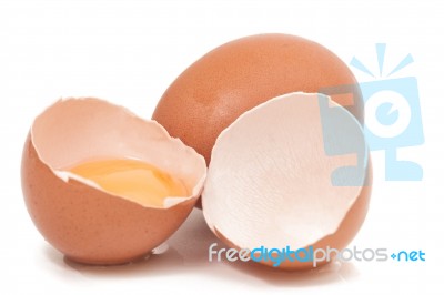 Cracked Egg With Yolk Stock Photo