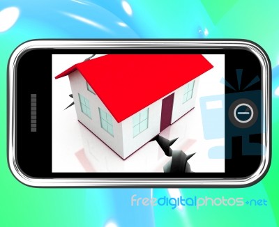 Cracked Foundations On Smartphone Showing Damaged House Stock Image