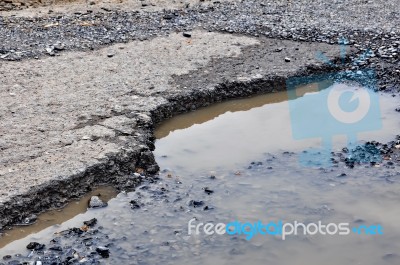 Cracked Road Stock Photo