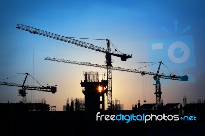 Crane And Construction Site Stock Photo