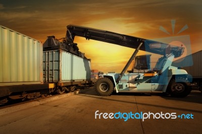 Crane Lifts A Container Stock Photo