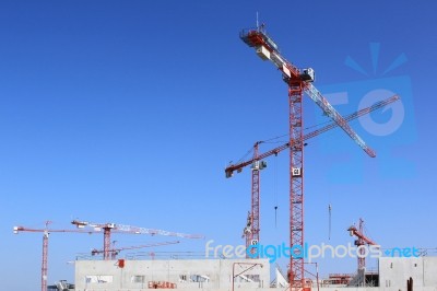 Cranes On Building Construction Stock Photo