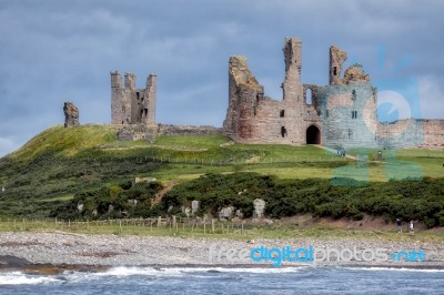 Craster, Northumberland/uk - August 18 : View Of Dunstanburgh Ca… Stock Photo