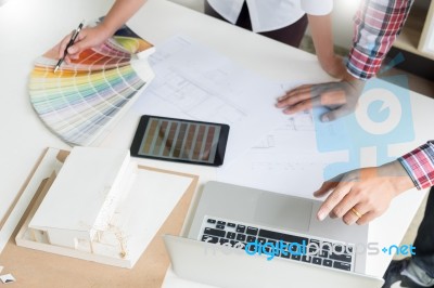 Creative Or Interior Designers Teamwork With Pantone Swatch And Stock Photo