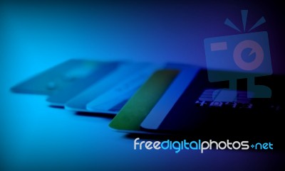 Credit Cards In Blue Color Lighting Stock Photo