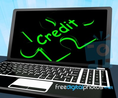 Credit Puzzle On Laptop Shows Ecommerce Stock Image