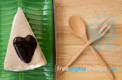 Crepe Cake On Banana Leaf Plate And Wooden Fork Stock Photo